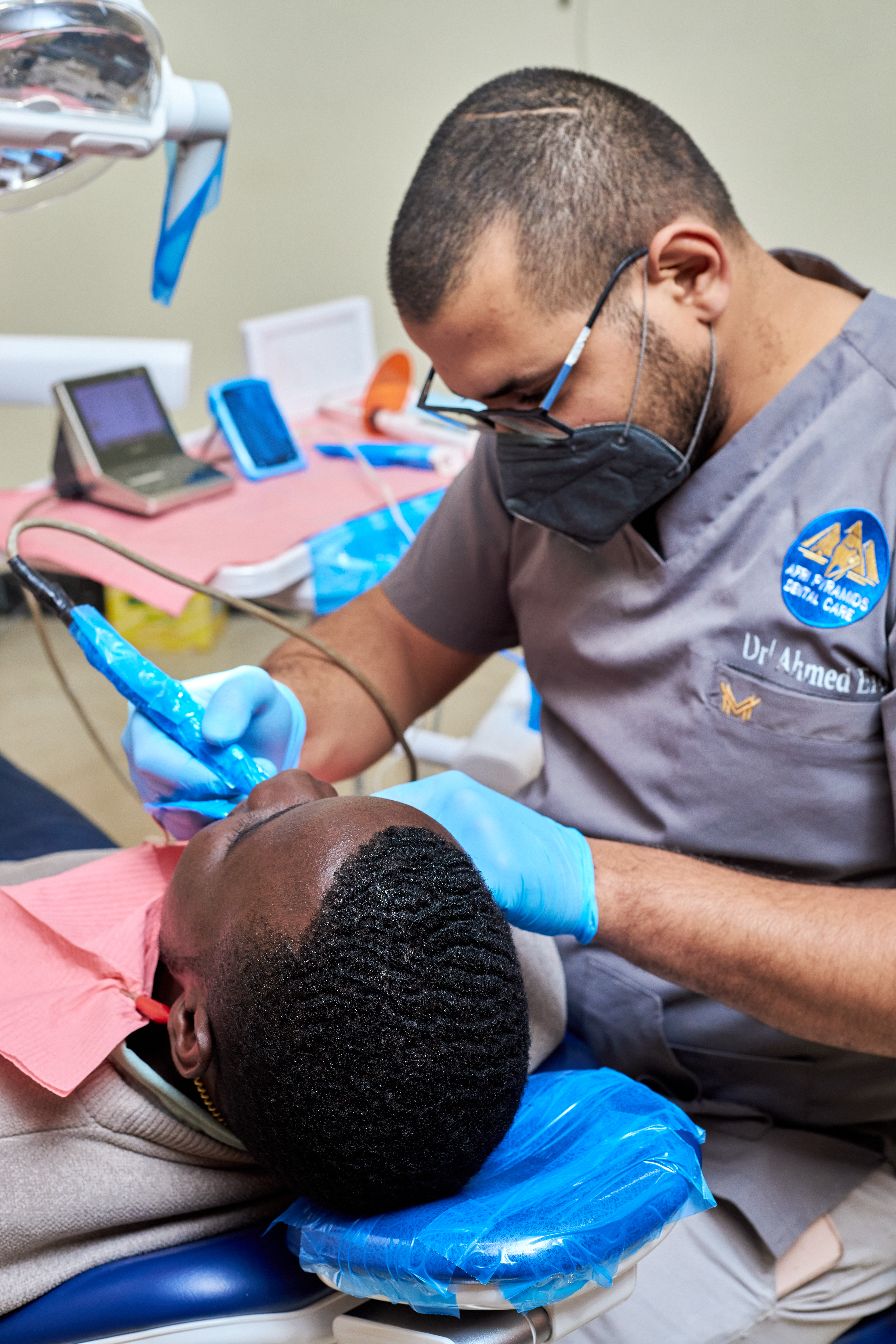 Friendly dentist in modern clinic